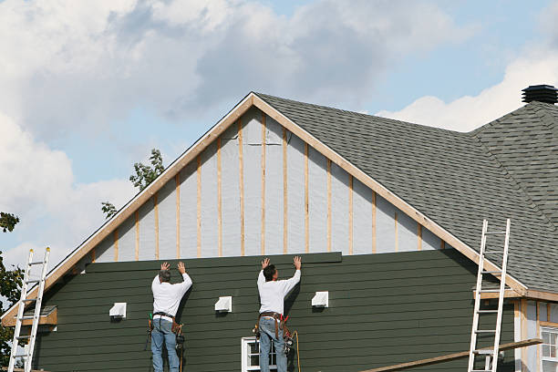 Professional Siding technician working in Stanfield, NC